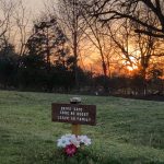 Drive Safe Come as Guest Leave as Family sign at Ozark View RV Park at sunset