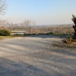 RV campsite with picnic table and Ozark valley view at Ozark View RV Park