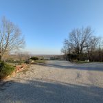 Gravel pull-thru RV sites with scenic valley overlook at Ozark View RV Park near Branson MO