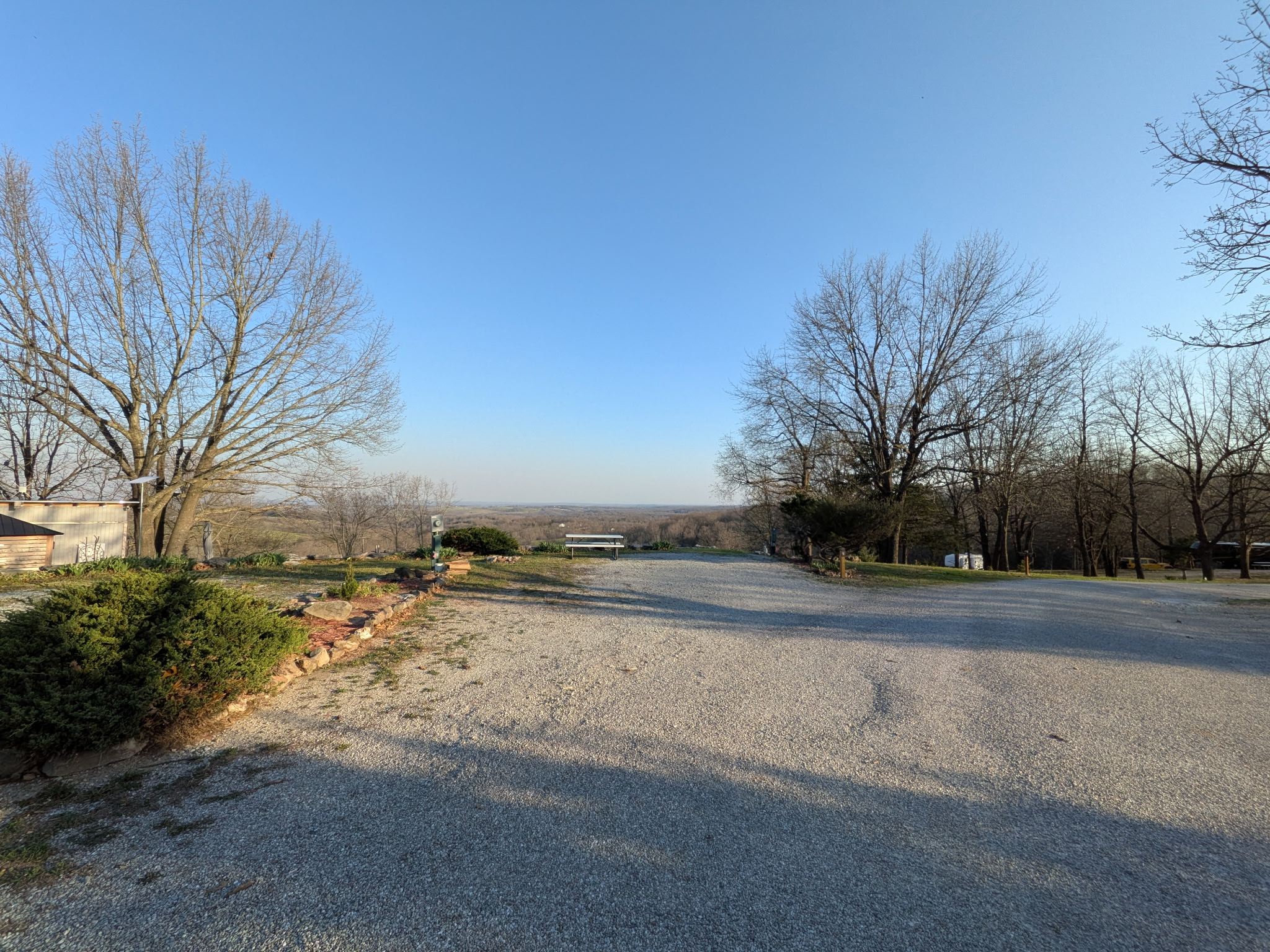Gravel pull-thru RV sites with scenic valley overlook at Ozark View RV Park near Branson MO